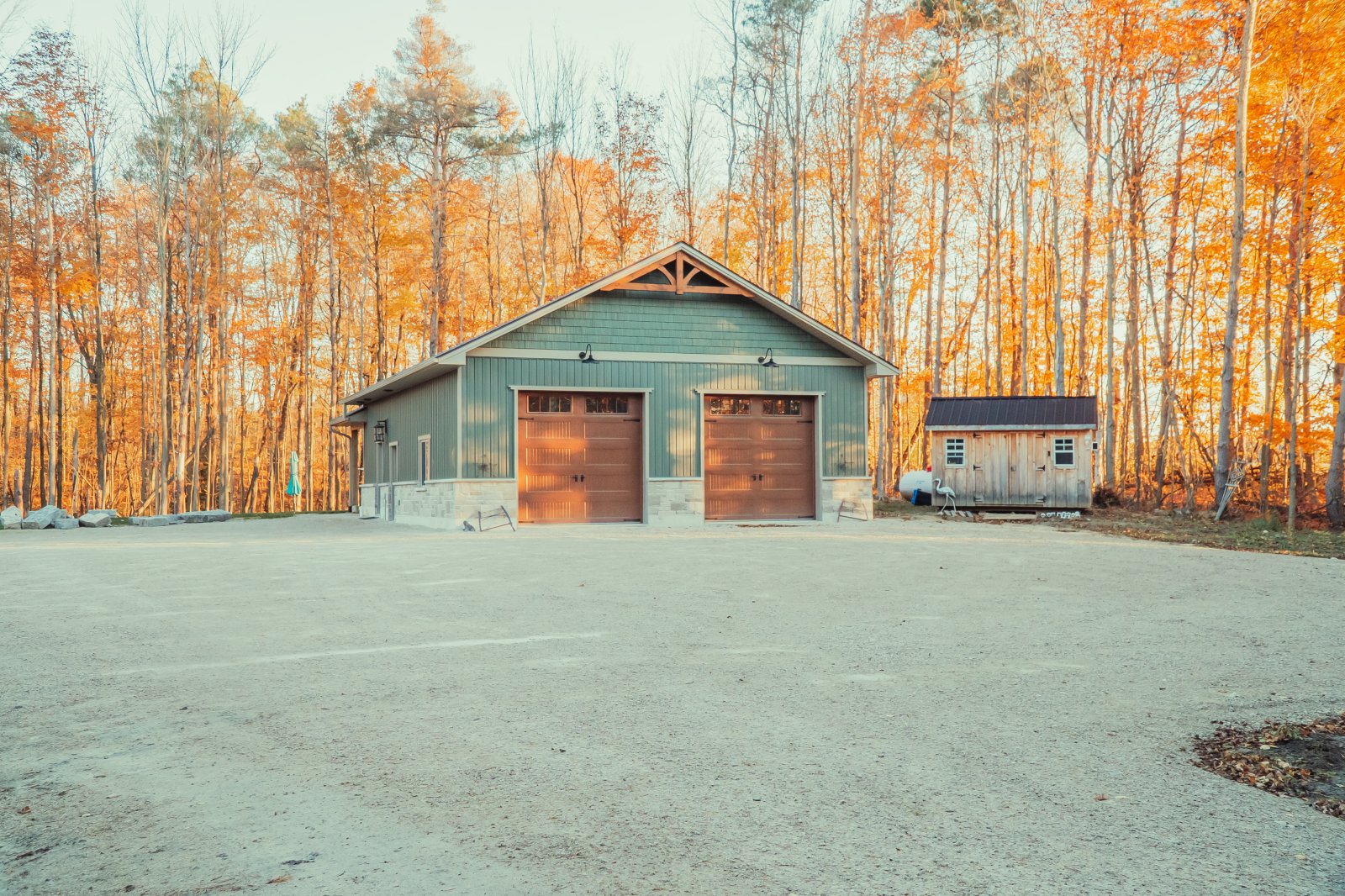 Lang's General Contracting — custom detached workshop and garage with timber gable accents